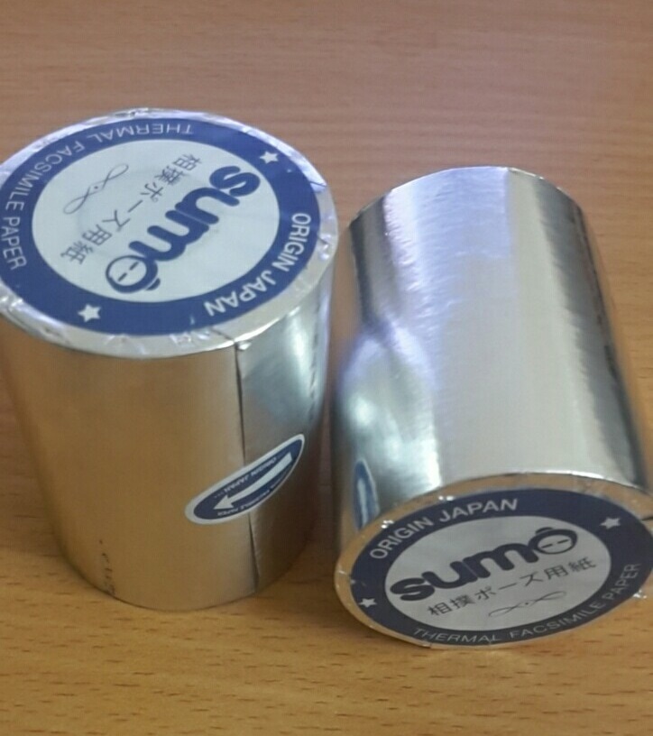Giấy in hóa đơn Sumo K57-58 bọc bạc